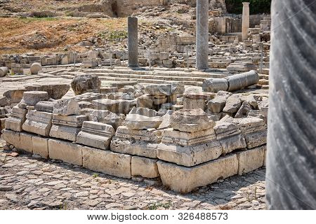 Ruins Of Sanctuary Of Apollo Hylates Located At The Beach Of Mediterranean Sea. Near An Ancient Gree