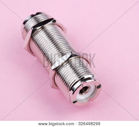 Radio Connector On Pink Background At Dry Sunny Summer Day
