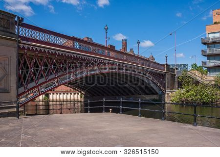 View Of An Old Cast Iron Road Bridge Over The Aire And Calder Navigation In Central Leeds From The P