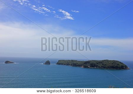 Motueka island and poikeke island seen from the walkway to the cathedral cove
