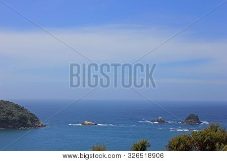 islands in the pacific ocean near cathedral cove