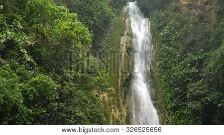Beautiful Waterfall In Green Forest. Tropical Mantayupan Falls In Mountain Jungle, Philippines, Cebu