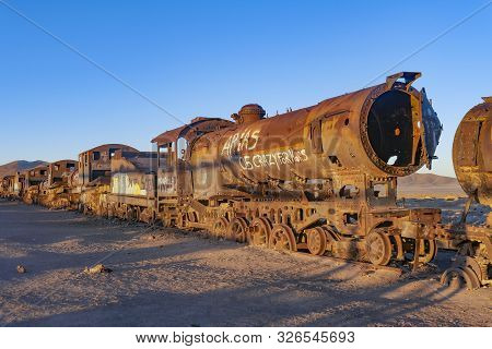 Salar De Uyuni, Uyuni Region, Bolivia - July 31, 2019:  Great Train Graveyard. Train Cemetery In The