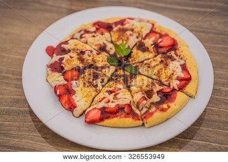Delicious Strawberry Pizza On A Balinese Tropical Nature Background. Bali Island, Indonesia