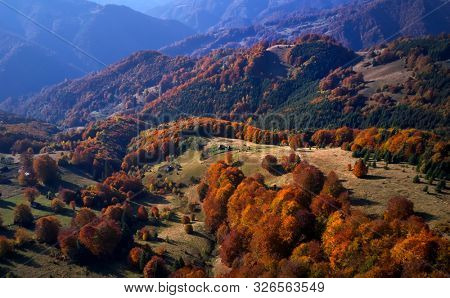 aerial view of Carpathian mountains countryside in autumn morning, Romania