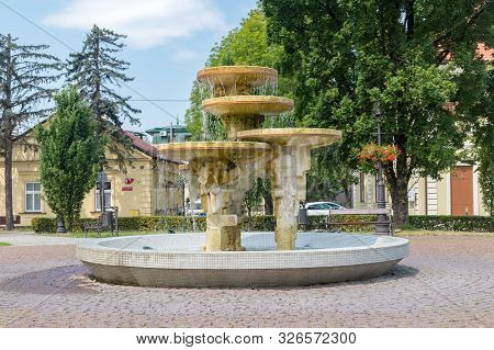 Wieliczka, Poland - July 27, 2019: Water Founain At Square Of Mieszyslaw Skulimoski At Summer Day.