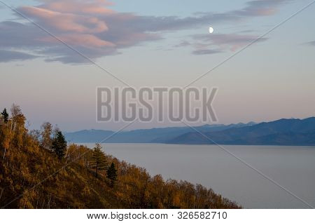Evening Lake With The Autumn Trees And Sky