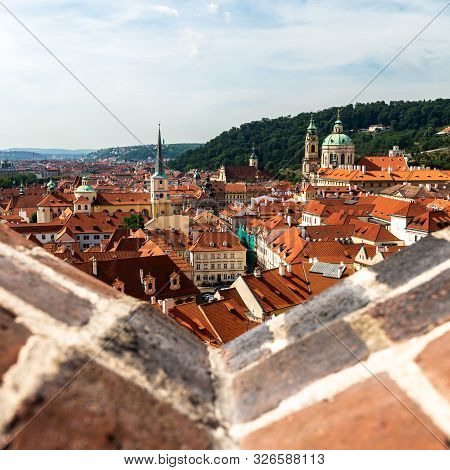 View On Prague Panorama With Red Roofs And Historic Architecture From Staromestska Radnice, Old Town