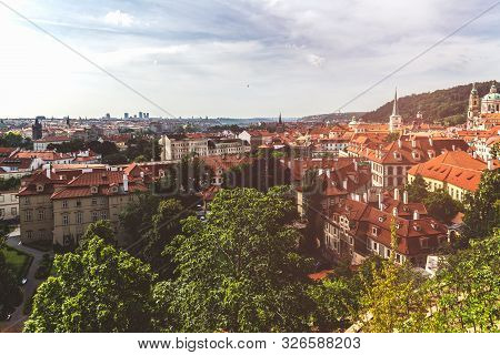 View On Prague Panorama With Red Roofs And Historic Architecture From Staromestska Radnice, Old Town