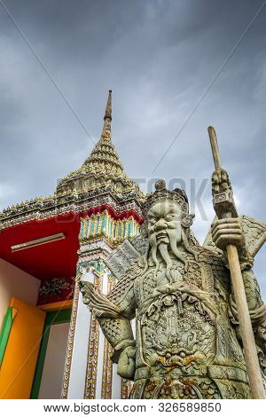 Chinese Guard Statue In Wat Pho Buddhist Temple, Bangkok, Thailand