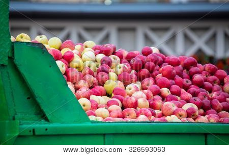 Full Body Of Apples In A Green Truck At The Fair