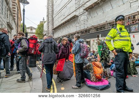 London, Uk - October 7, 2019: Participants Of The Protest Rally Extinction Rebellion