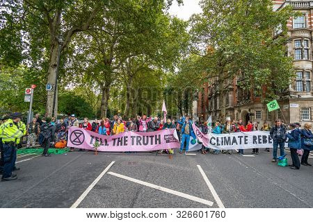London, Uk - October 7, 2019: Participants Of The Protest Rally Extinction Rebellion