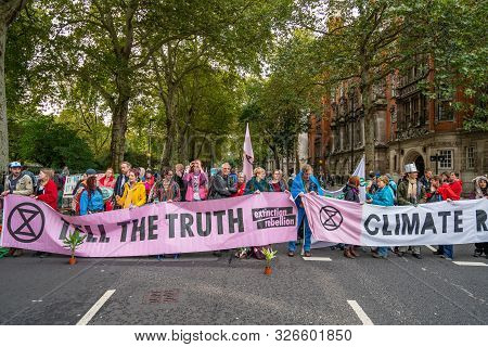 London, Uk - October 7, 2019: Participants Of The Protest Rally Extinction Rebellion