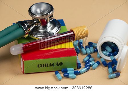 Fake Medicine Box With The Name Of The Disease Coracao And A Glucometer
