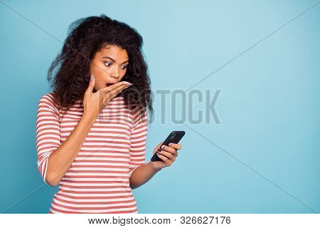 Photo Of Curly Wavy Trendy Horrified Fearful Girl Standing Near Empty Space Holding Telephone Receiv