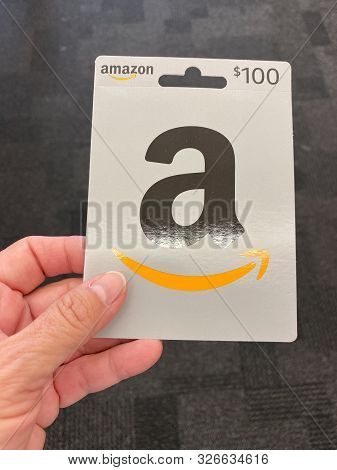 Orlando,fl/usa-10/7/19: An Amazon Gift Card Ready For A Person To Purchase As The Perfect Gift For A