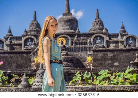 Young Woman Tourist In Budhist Temple Brahma Vihara Arama Banjar Bali, Indonesia