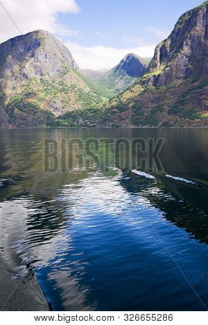 The Roll-call Of Sky And Water In The Aurlandsfjord In Norway. The Aurlandsfjord Is A Branch Of The 