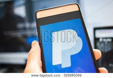 CLUJ-NAPOCA, ROMANIA - June 22, 2019: PayPal the largest operator of electronic money it was founded in 1998. PayPal most popular way of reception and sending Internet of payments at the eBay auction.