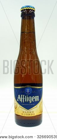 Amsterdam, The Netherland - October 9, 2019: Bottle Of Affligem Blonde Beer, A Belgian Styled Pale A