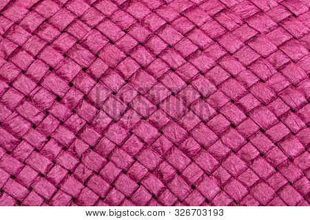 Textile Background - Weaving Of Summer Straw Hat From Toyo Fibers Colored In Pink Color Close Up