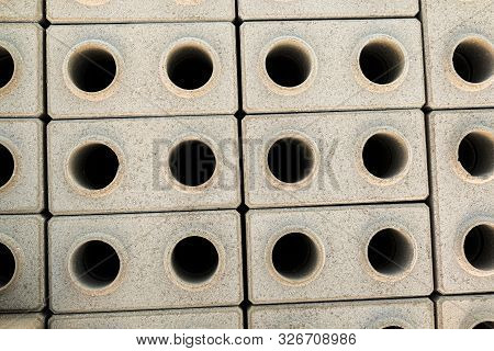 Hyper-pressed Hollow Facing Bricks Stacked On A Pallet. Top View.