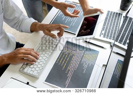 Teamwork Team Programmer Working With Computer Desktop And Laptop And Computer Code In Paper Print.