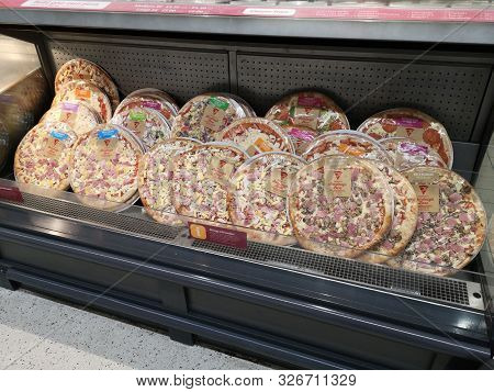 London, Uk - October 7 : Variety Of Frozen Pizza In Refrigerator Sold In Supermarket On October 7, 2