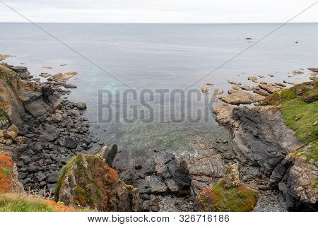 View Of The Rocky Coastline At The Lizard In Cornwall