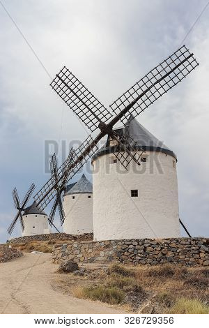 Vertical View Of Old Windmills On Calderico Hill Of The Spanish Municipality Of Consuegra. These Win