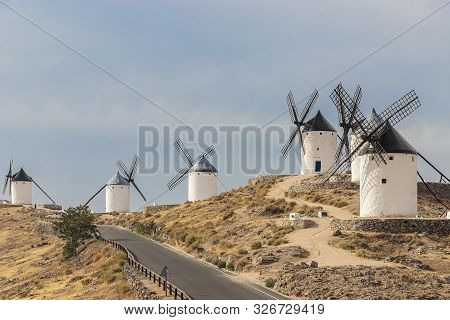Horizontal View Of Old Windmills On Calderico Hill Of The Spanish Municipality Of Consuegra. These W
