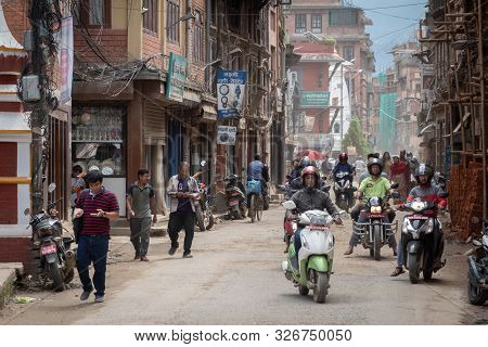 Foot And Motorcycle Traffic In Kathmandu
