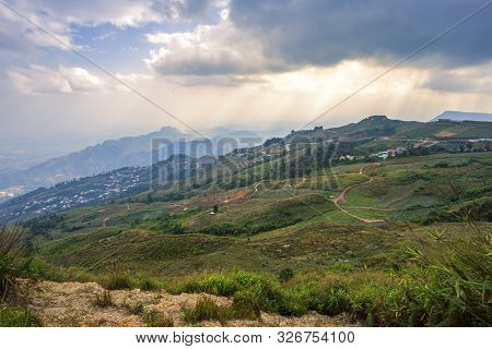 Sunset Of Panoramic View Mountain Range With Village On Nature Trail In Phu Thap Buek National Park 