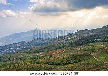 Sunset Of Panoramic View Mountain Range With Village On Nature Trail In Phu Thap Buek National Park 