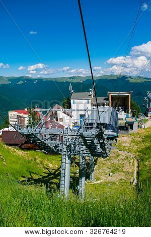 Sinaia, Prahova, Romania - June 29, 2019: View Of Cable Car Gondola Pillars Installation In Sinaia 1