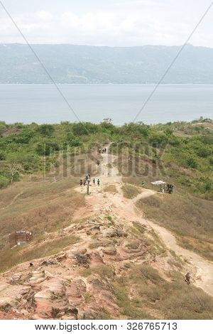 Tourists Walking Hiking Trekking Tour Trail To Taal Volcano, Batangas, Philippines