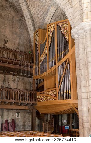 Rocamadour, France - September 3, 2018: Pipe Organ In Basilica Of St-sauveur Blend Into The Cliff In