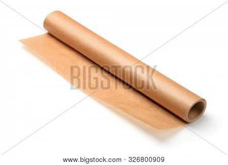 Roll of brown baking parchment paper isolated on white 