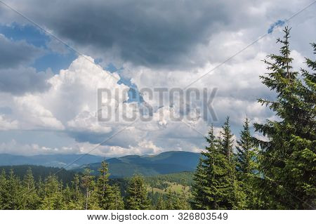 Summer Landscape In The Carpathian Mountains. View From The Mountain Peak Hoverla. Ukrainian Mountai