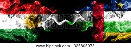 Kurdistan Vs Central African Republic Smoke Flags Placed Side By Side. Thick Colored Silky Smoke Fla