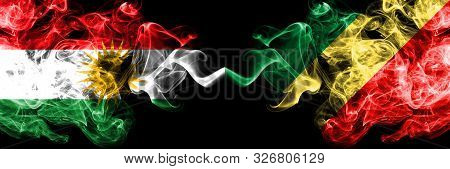 Kurdistan Vs Congo, Congolese Smoke Flags Placed Side By Side. Thick Colored Silky Smoke Flags Of Ku