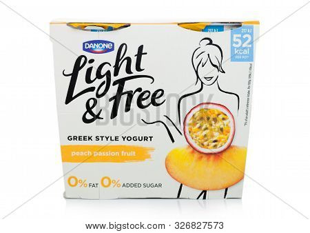 London, Uk - October 10, 2019: Pack Of Danone Light & Free Greek Style Natural Yogurt With Peach And