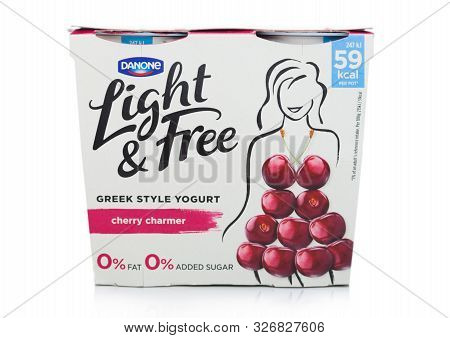 London, Uk - October 10, 2019: Pack Of Danone Light & Free Greek Style Natural Yogurt With Cherry On