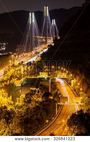 Sunset and light illumination of Tsing ma bridge landmark suspension bridge in Tsing yi area of Hong Kong China.