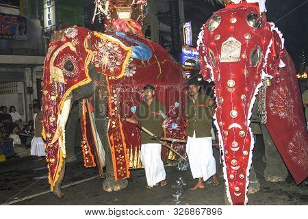 Kandy, Sri Lanka - Aug 12, 2005: Elephant Riders Participates The Festival Pera Hera In Kandy To Cel