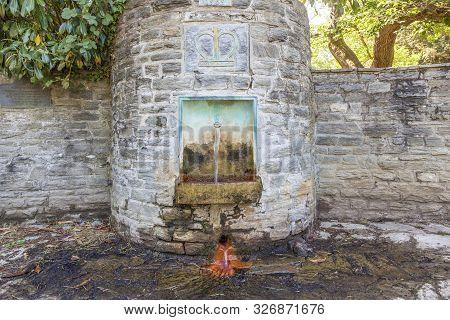 Kronberg, Germany - June 2, 2011: Famous Fountain Theodorus Quelle In Kronberg. The Water Is Good Fo