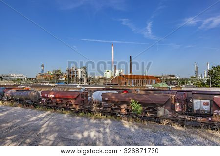 Frankfurt, Germany - June 27, 2011: Industry Park In Frankfurt Hoechst With Tank And Chimney Under B