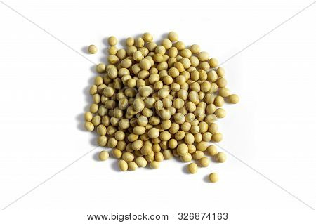 A Pile Of Dried Soybeans On White Background