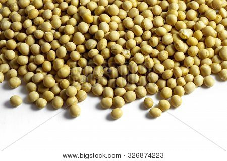 A Pile Of Dried Soybeans On White Background